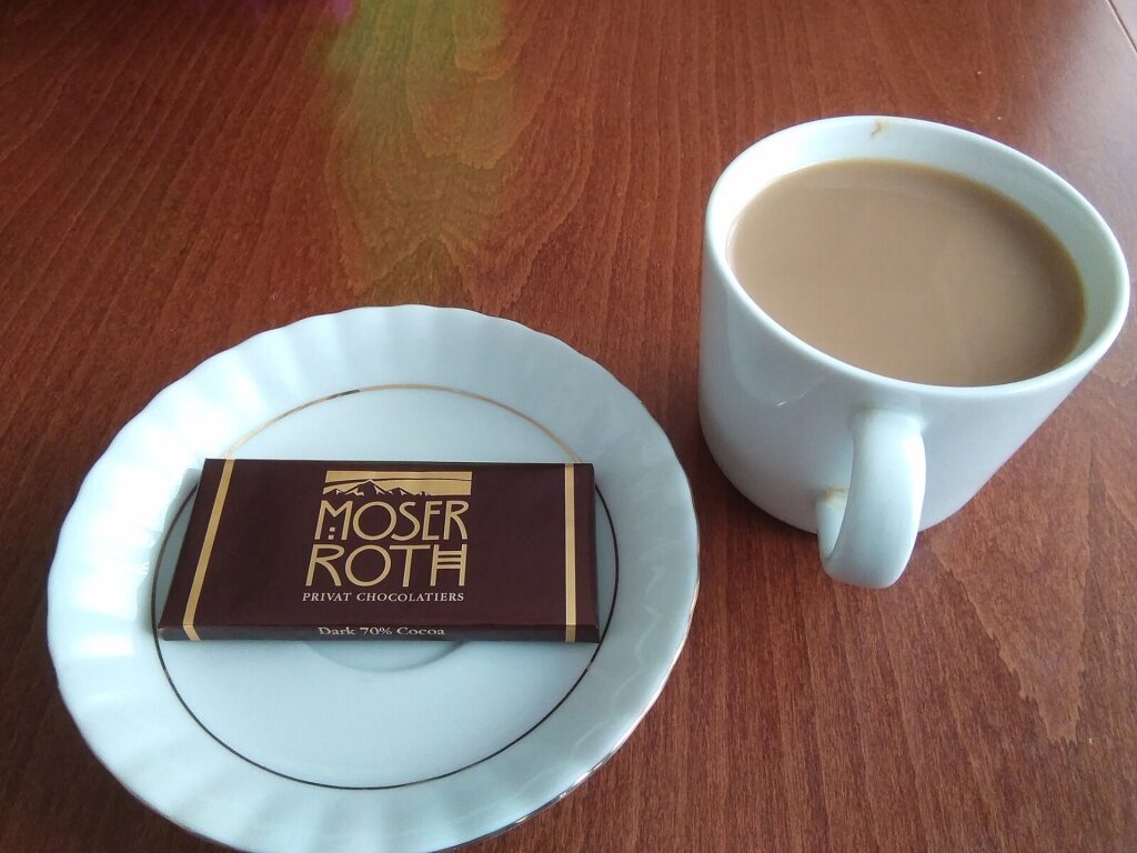 Moser-Roth chocolate on a plate with coffee