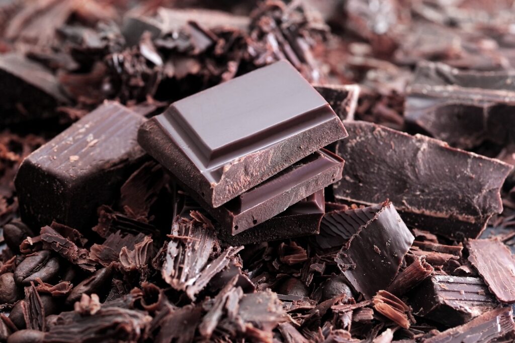 Close-up of broken dark chocolate pieces