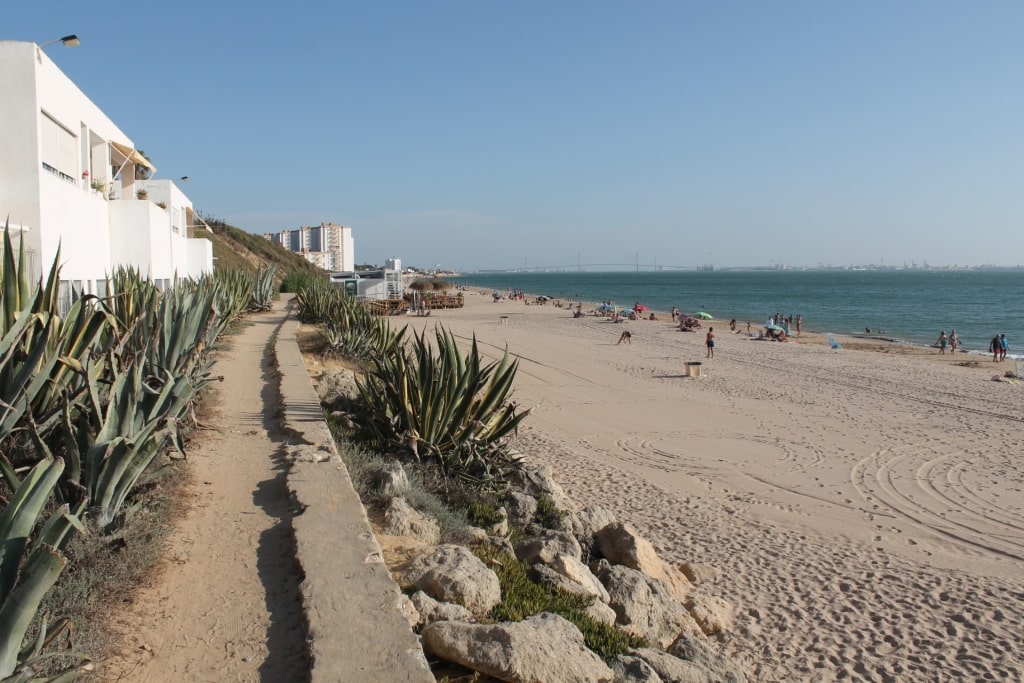 Playa de Las Redes beach with soft sand and blue waters in El Puerto de Santa María