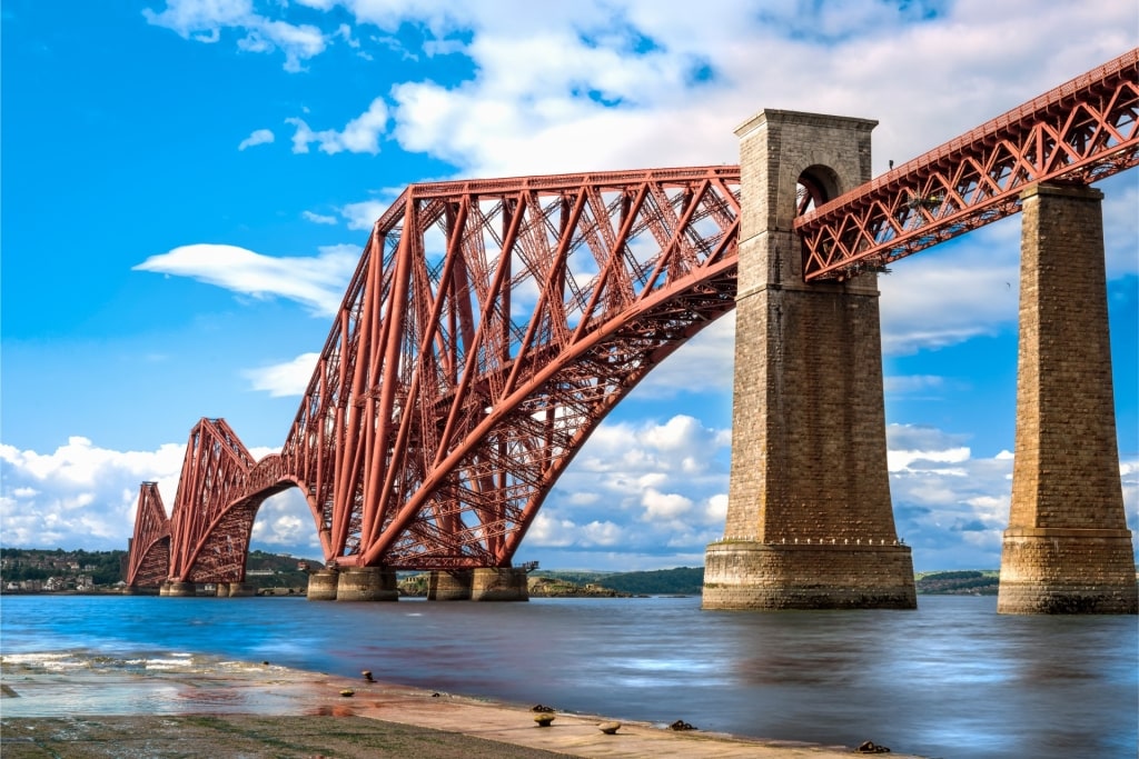 Forth Bridge in Scotland viewed from the shore