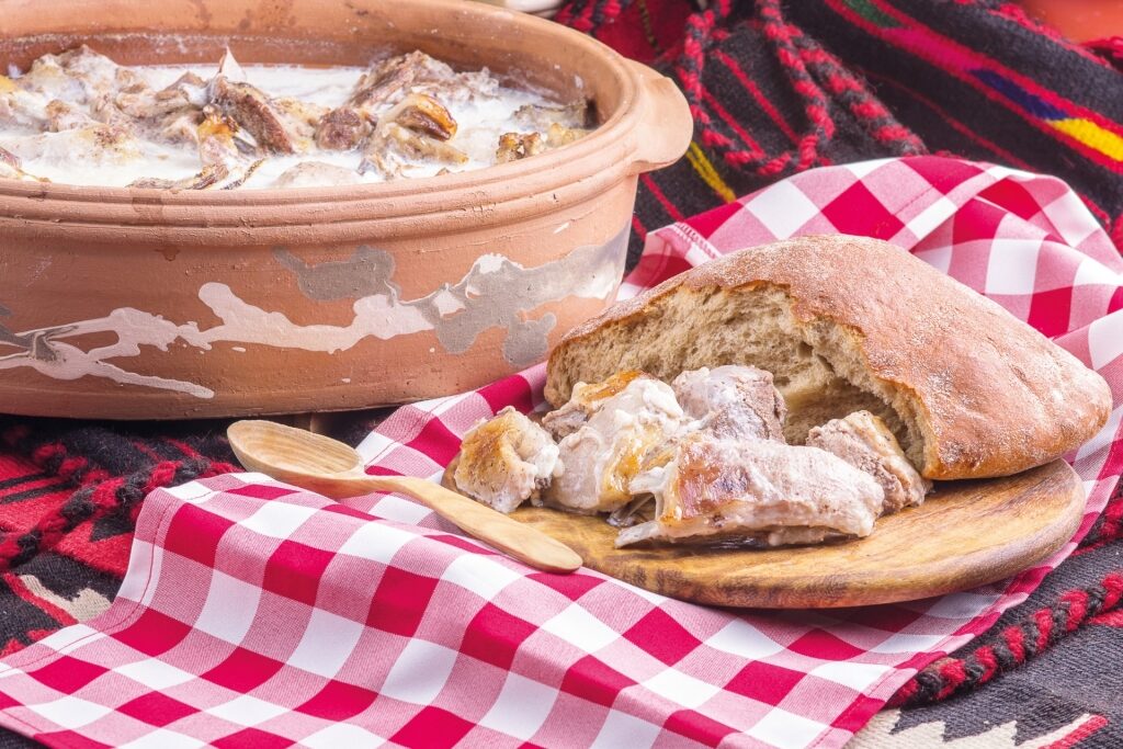 Traditional Montenegrin Brav u Mlijeku lamb cooked in milk sauce
