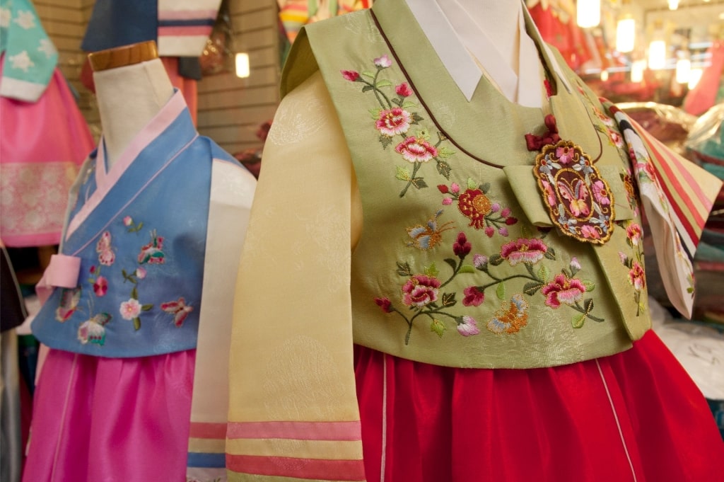 Elegant Korean hanbok garments displayed on mannequins