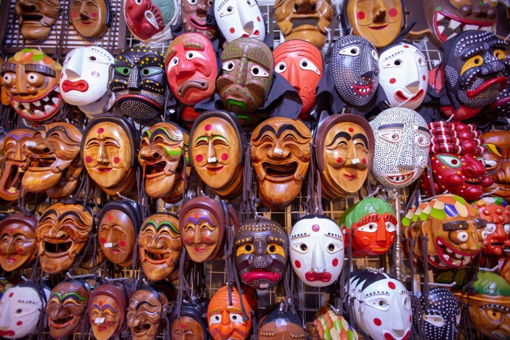 Assorted traditional Korean masks on display at a souvenir shop