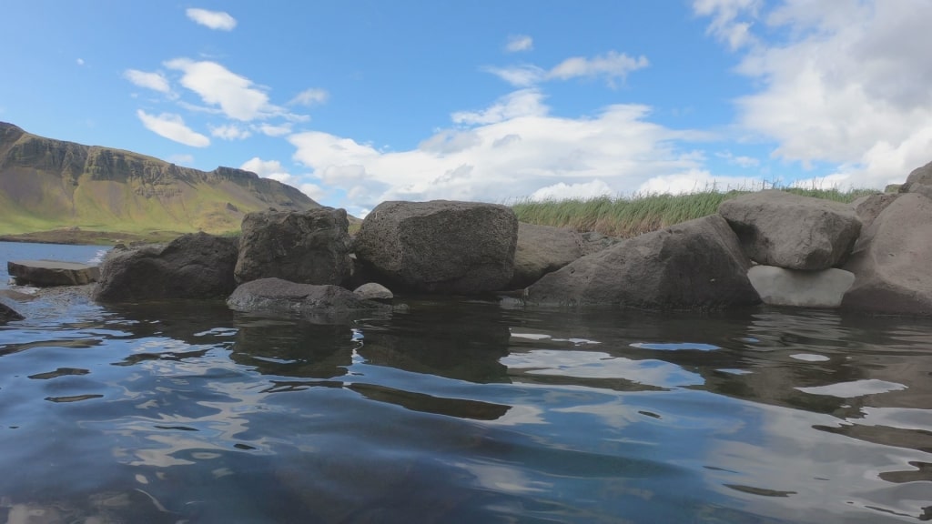 Iceland’s Hvammsvik Hot Springs with rugged rocks