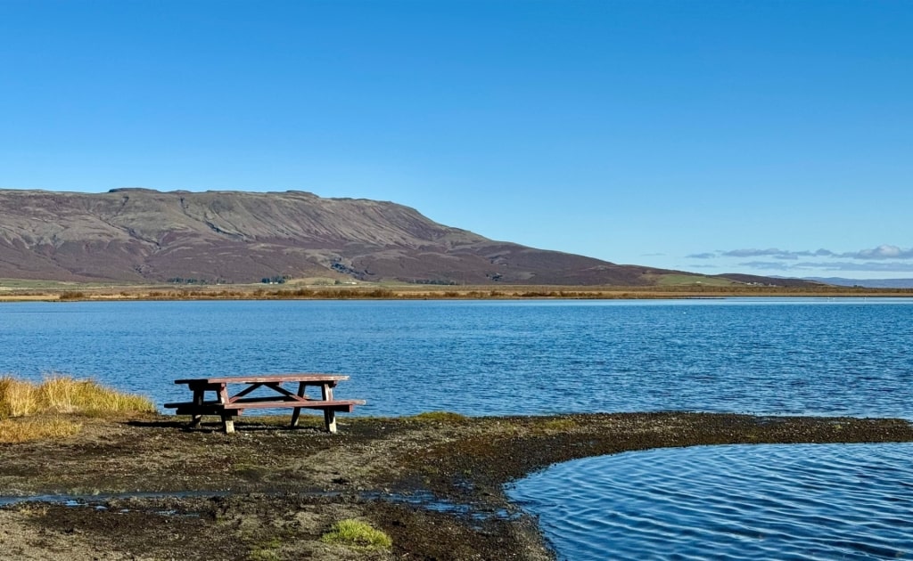 Icelandic geothermal baths at Laugarvatn Fontana with clear lake waters