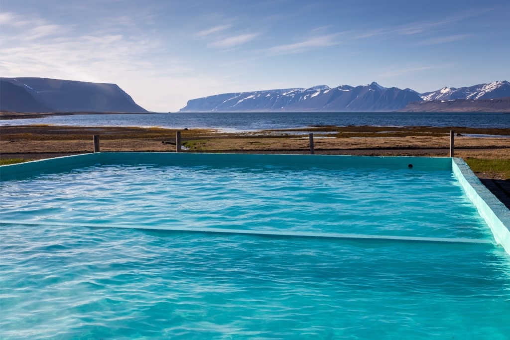 Outdoor Reykjafjardarlaug pool with steaming geothermal waters in Iceland