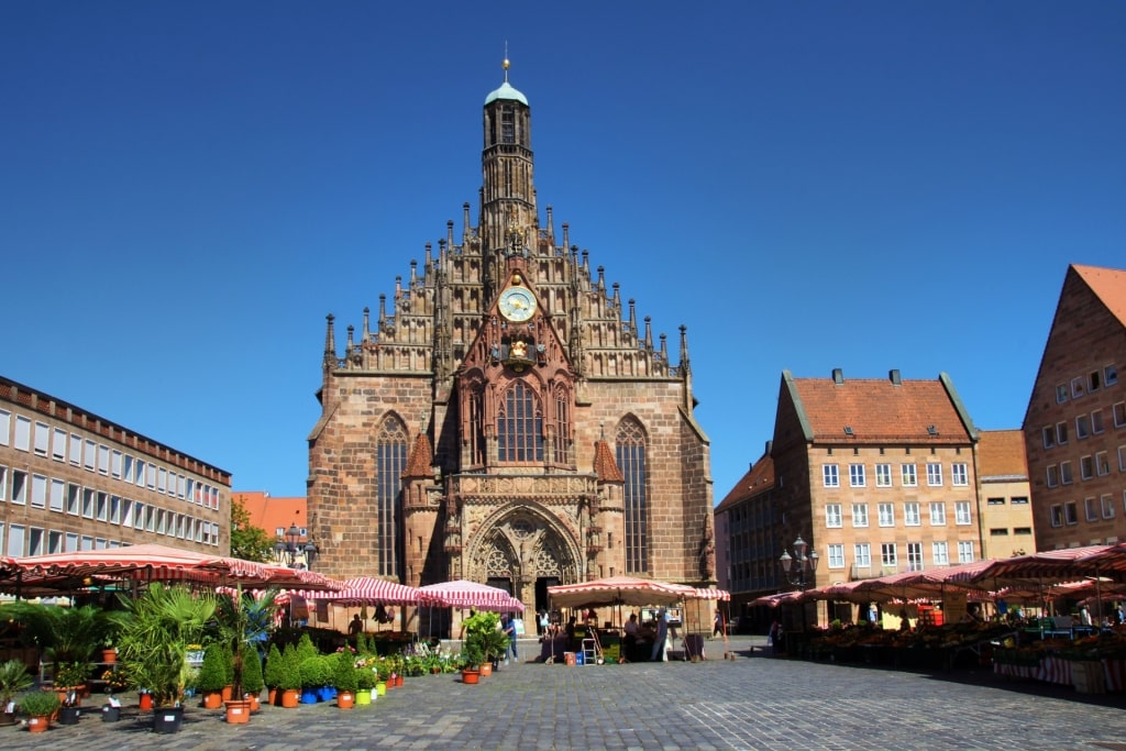 Hauptmarkt in Nuremberg featuring the Church of Our Lady and market vendors