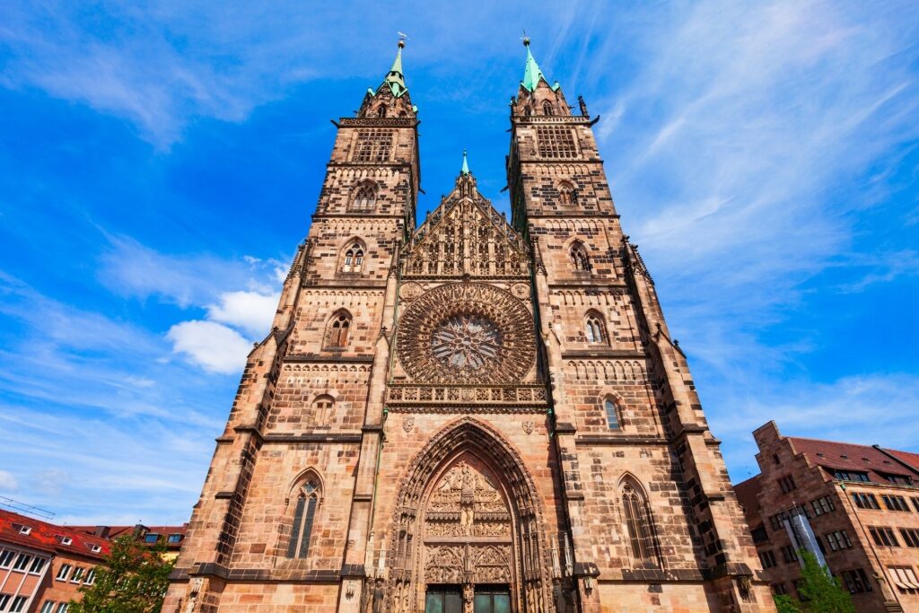Historic facade of St. Lawrence Church in Nuremberg, Germany under blue sky
