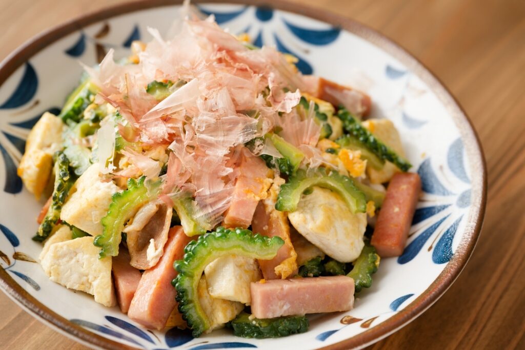 Plate of Gōyā Chanpurū, Okinawan stir-fry with bitter melon, tofu, and pork ham