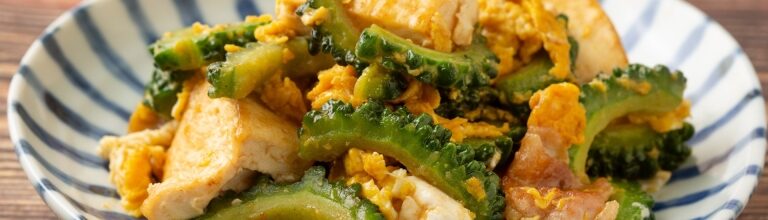 Plate of Gōyā Chanpurū, stir-fry Okinawan food with bitter melon, tofu, and pork
