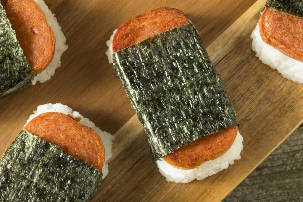 Freshly made SPAM musubi with soy-glazed SPAM slices