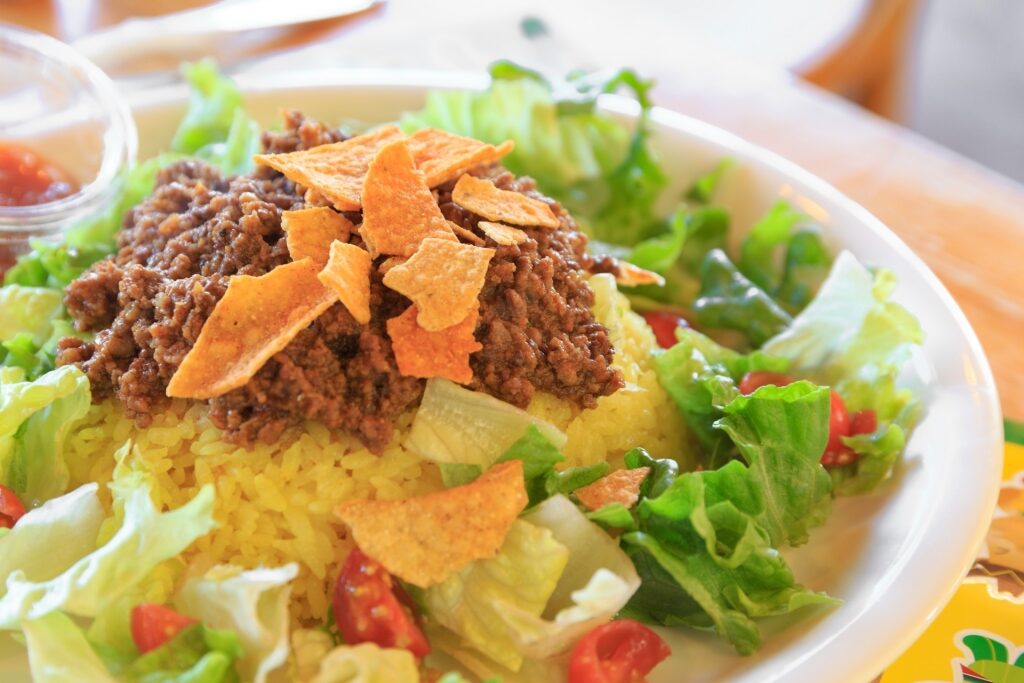 Okinawan taco rice served in a plate with toppings