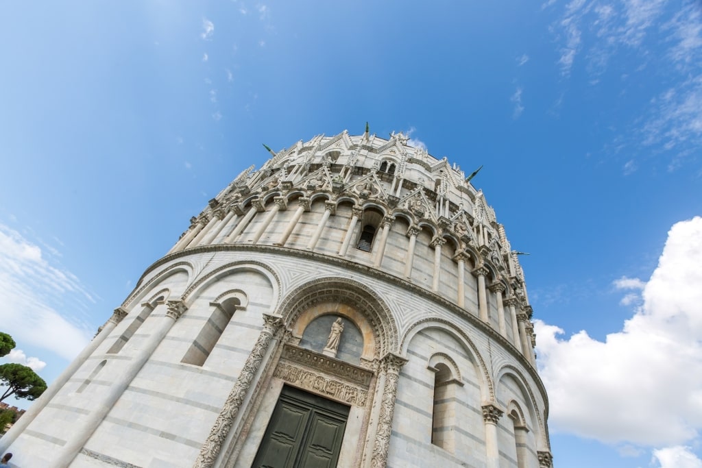 Pisa Baptistery in Piazza dei Miracoli showcasing intricate medieval design