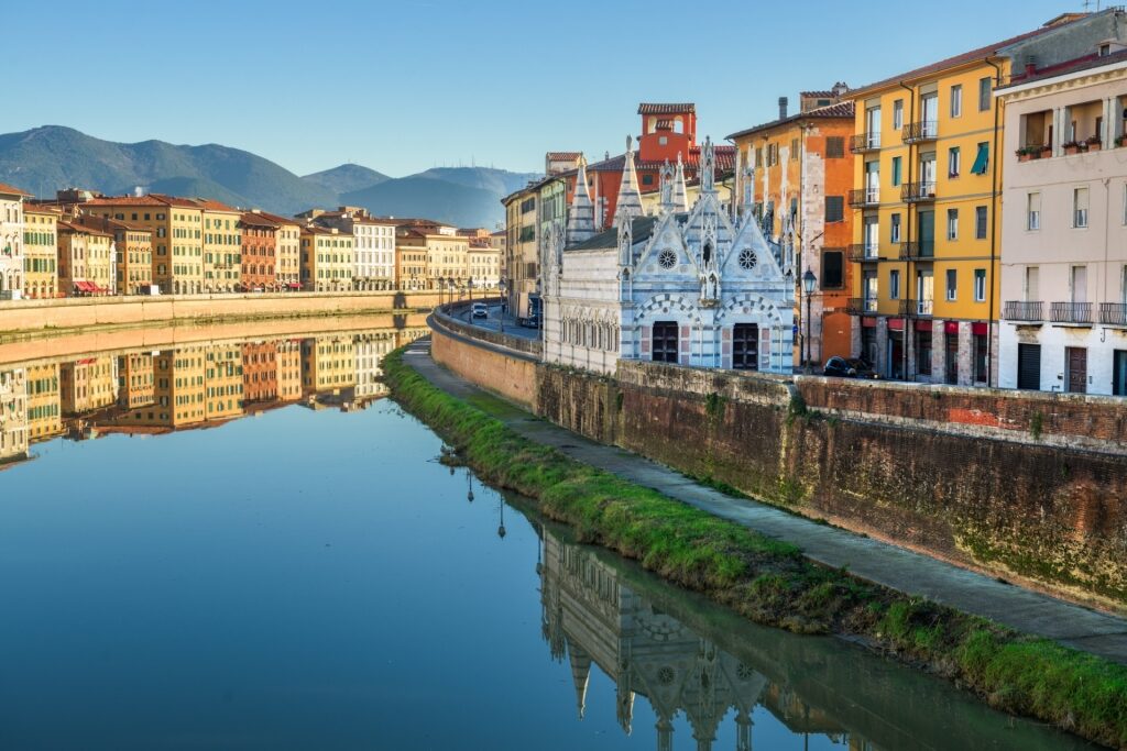 Scenic view of the Arno River flowing through Pisa, Italy