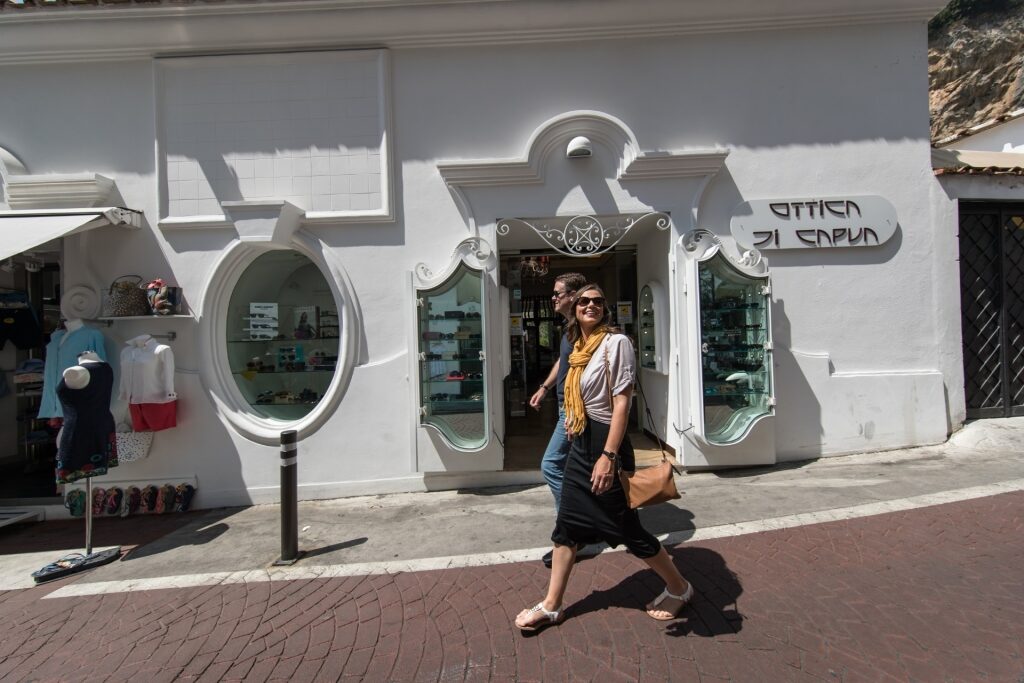 Travel couple wandering Positano’s charming streets