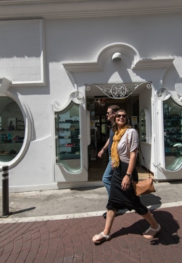 Travel couple wandering Positano’s charming streets
