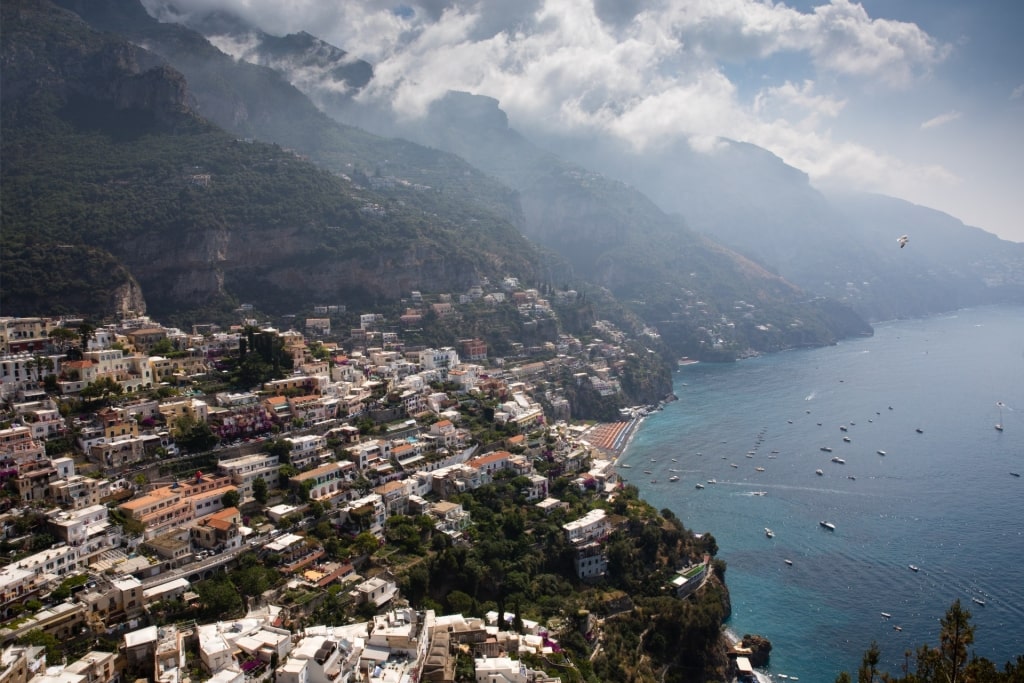 Aerial view of Positano’s colorful cliffside houses and coastline