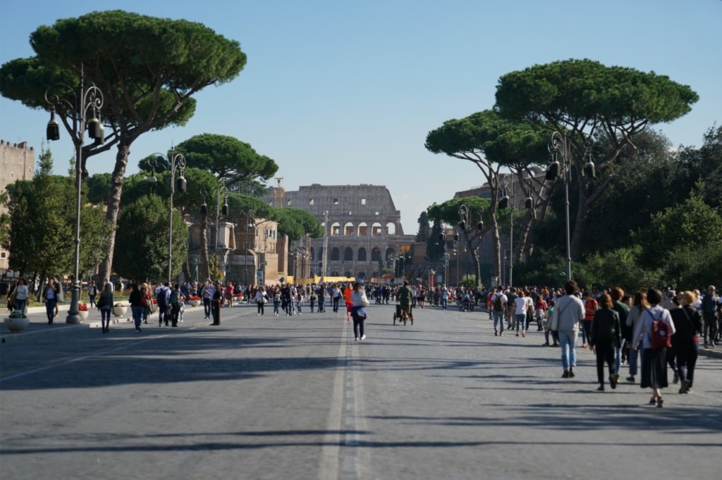 Street view of Via dei Fori Imperiali leading to the Colosseum