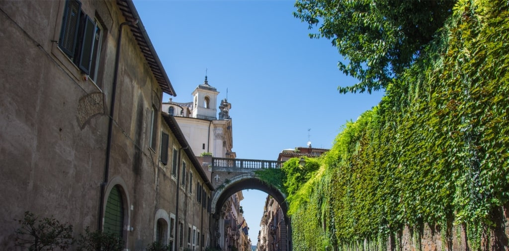 Gorgeous street of Via Giulia with view of the arch