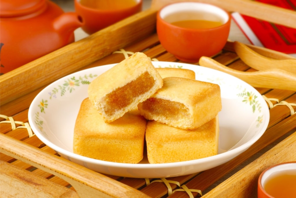 Traditional pineapple cakes on a plate as Taiwan souvenirs