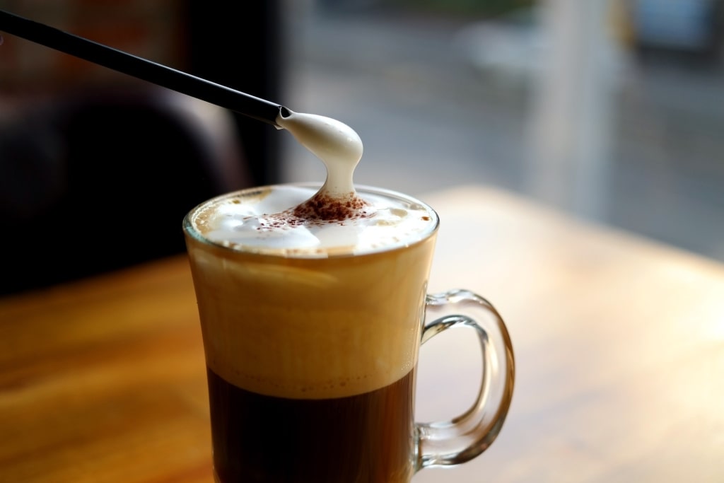 Traditional Einspänner coffee topped with whipped cream in Vienna