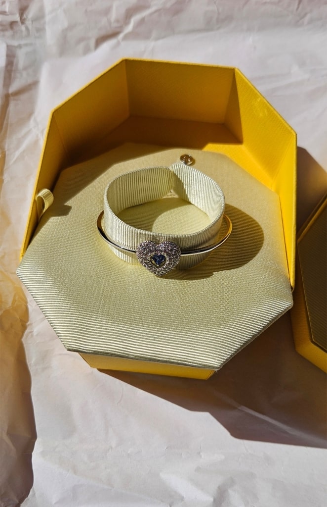 Swarovski Hyperbola bangle with blue and white crystals in heart design, rhodium plated