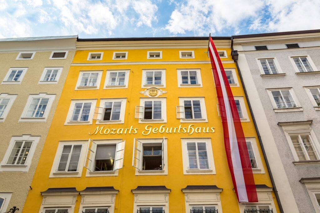 Mozart’s Birthplace with iconic yellow exterior in Salzburg city center