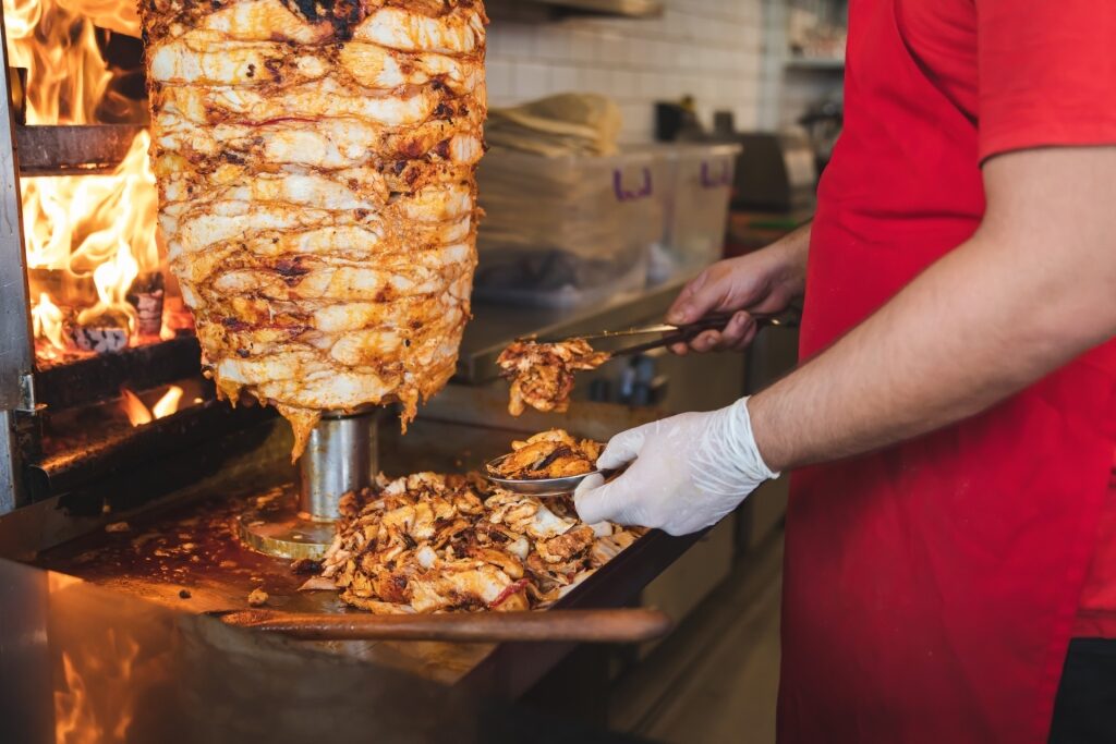 Street kebab vendor preparing food