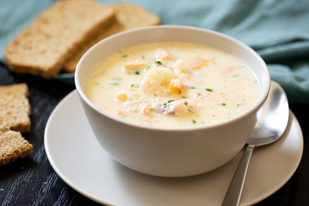 Bowl of warm seafood chowder
