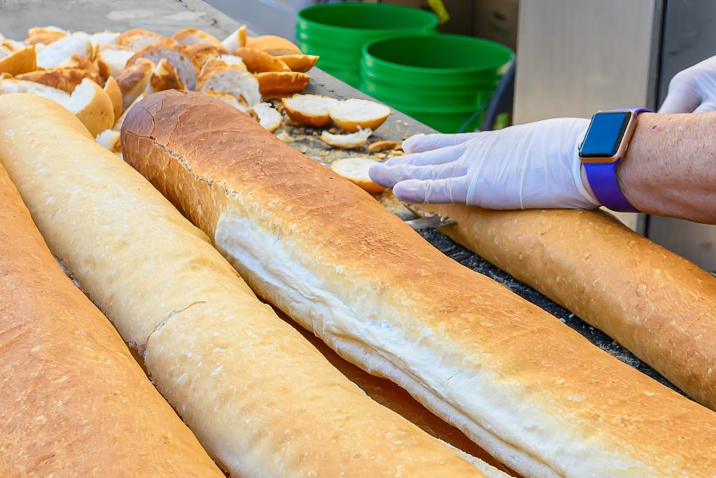 Man preparing sandwiches during Po-Boy Festival