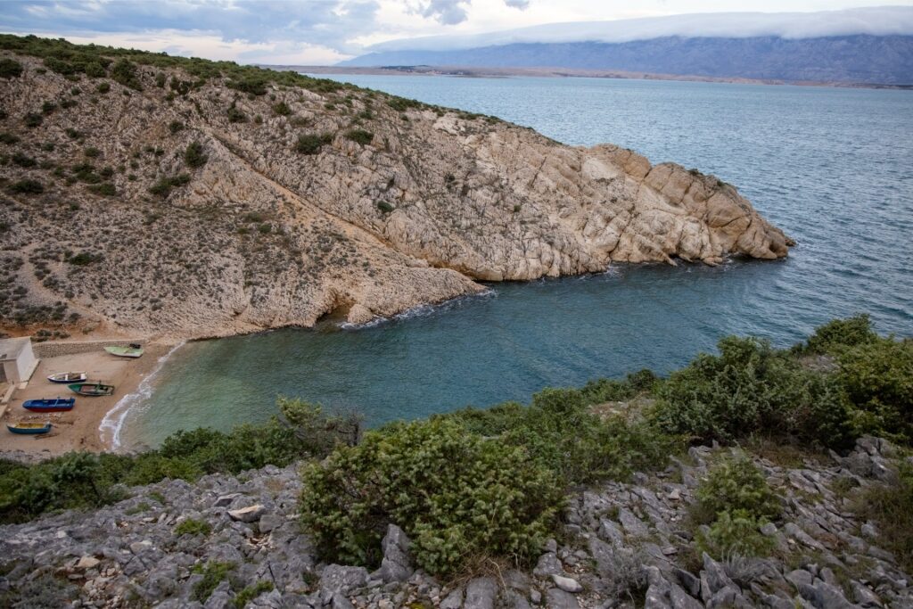 Pebble beach and pristine waters at Duboka Draga, a tranquil seaside spot in Vrsi