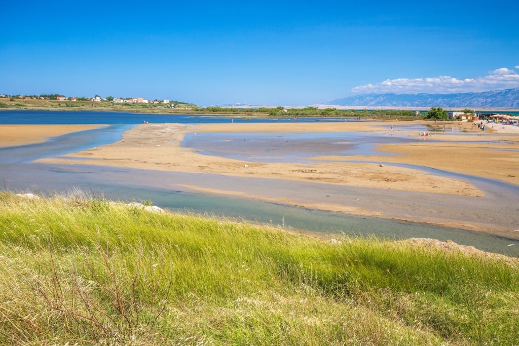 Wide sandy shoreline of Queen’s Beach in Nin, Croatia