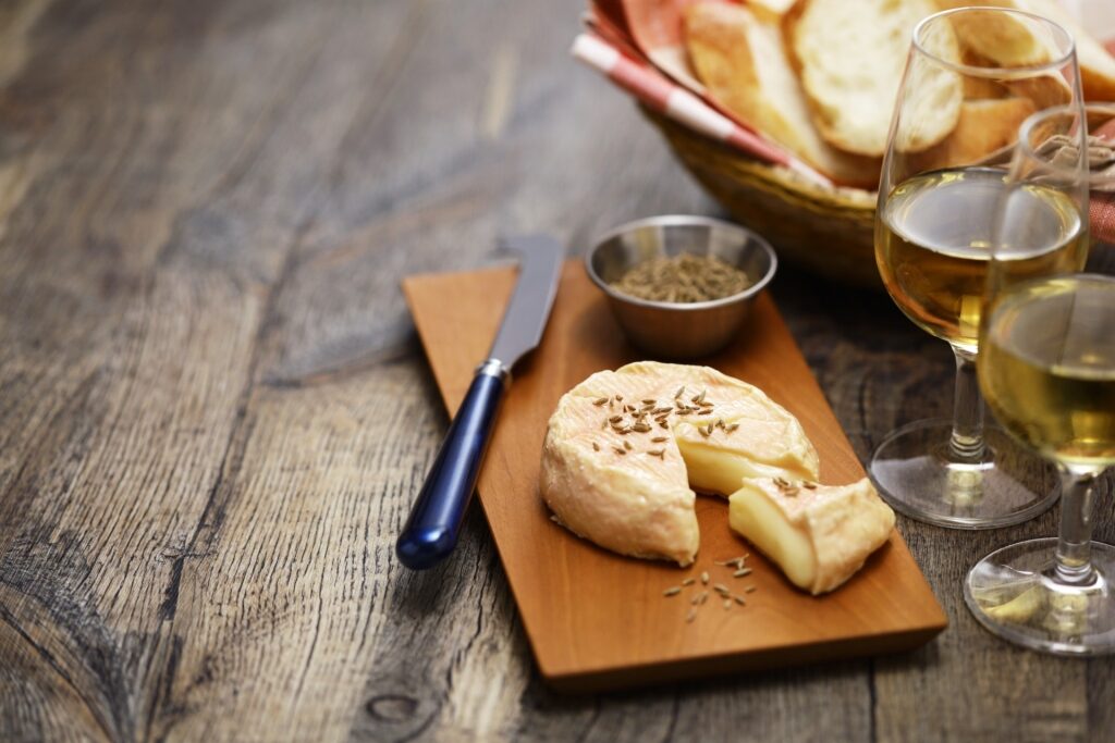 Traditional Munster washed-rind cheese with cumin seeds from Alsace