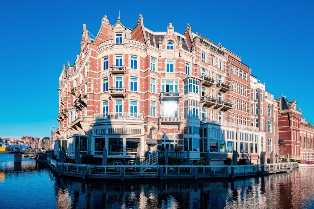 Amsterdam canal with traditional Dutch buildings along the waterfront