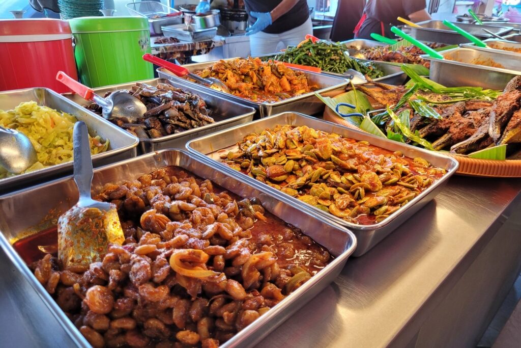 Variety of Penang, Malaysia street food displayed for sale