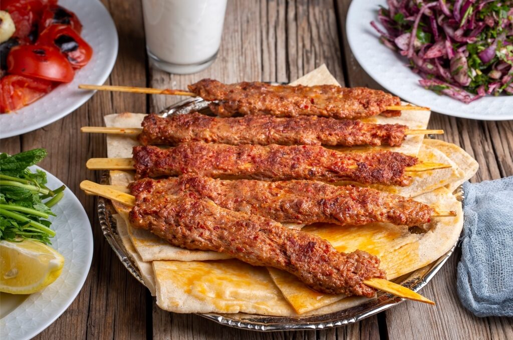 Freshly grilled Adana kebab served on warm flatbread