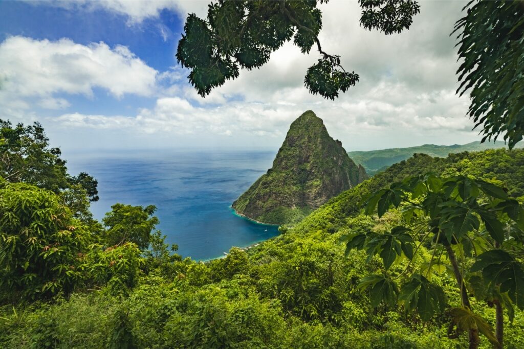 Scenic view of Gros Piton rising above lush green landscape in St. Lucia