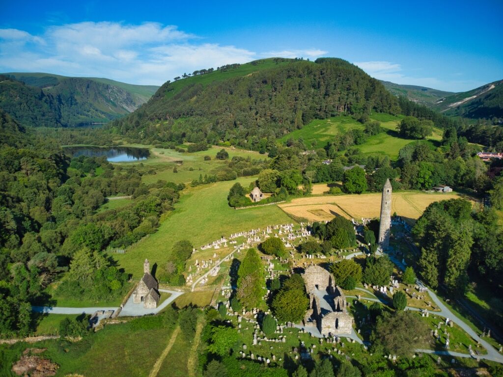 Aerial view of Glendalough with lush green valley and forests