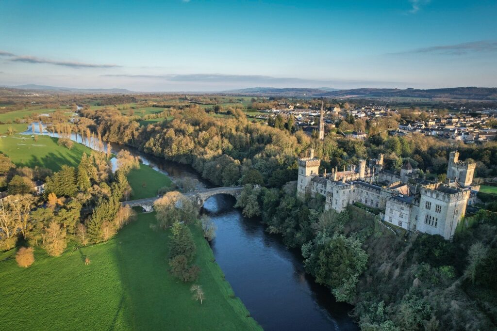 Majestic Lismore Castle seen from above overlooking the town below