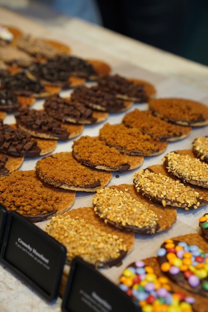 Freshly made stroopwafels displayed at a food store in Amsterdam