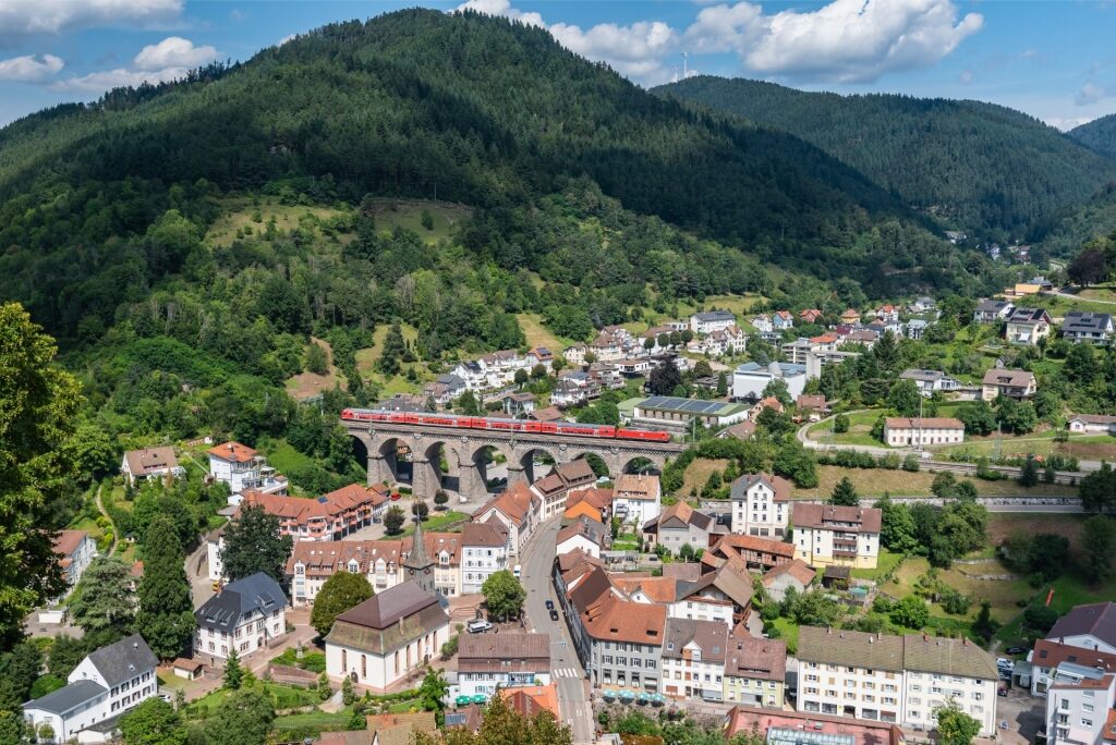 Scenic Black Forest Railway seen from above, surrounded by greenery
