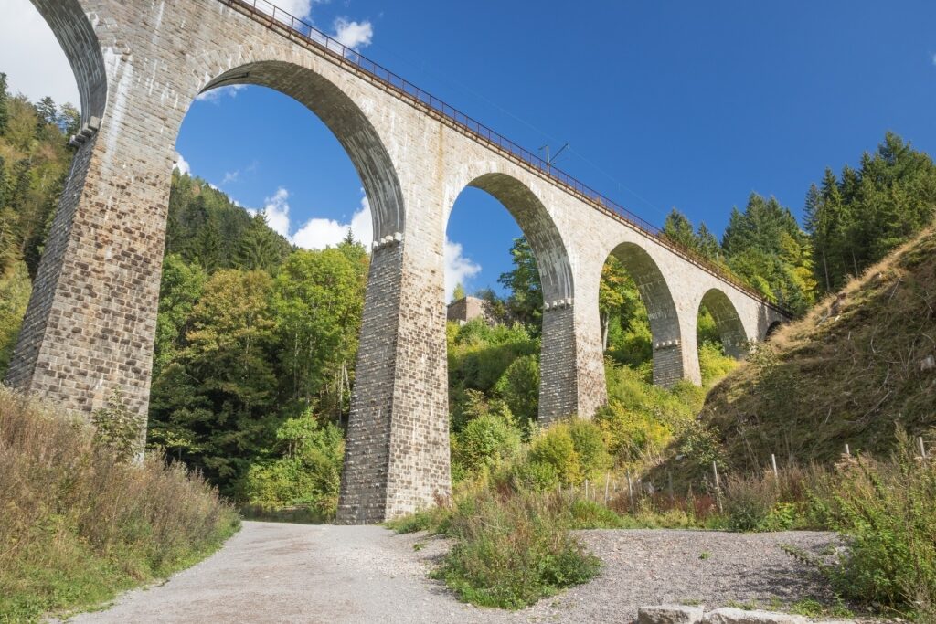 Historic bridge over Ravenna Gorge surrounded by dense Black Forest