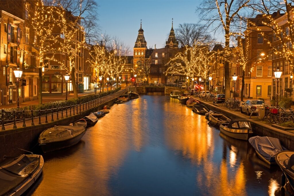 Scenic canal view of Amsterdam illuminated for Christmas in the Netherlands