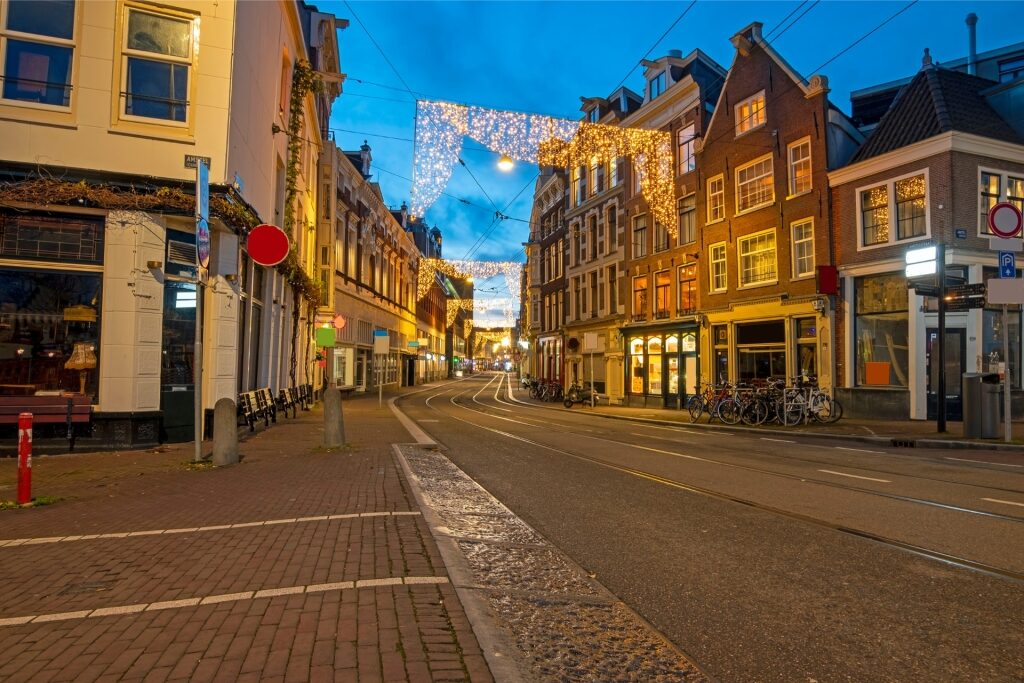 Decorations and lights illuminating an Amsterdam street for Christmas in the Netherlands