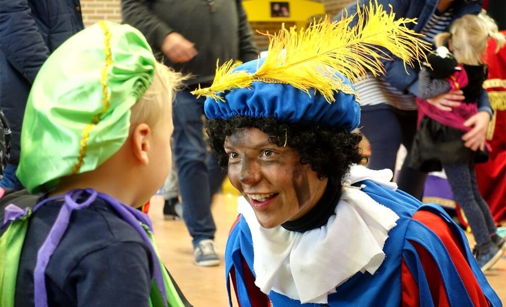 Festive Piet costume worn by a lady at a Dutch holiday event