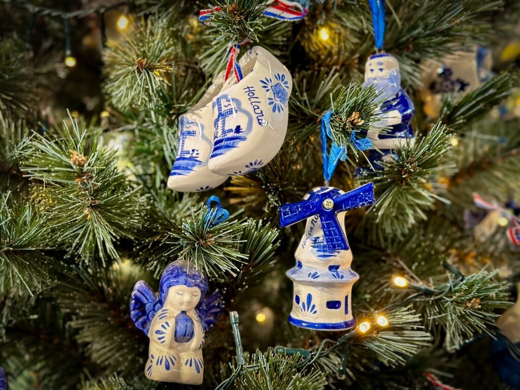 Close-up of Christmas tree ornaments and festive decorations