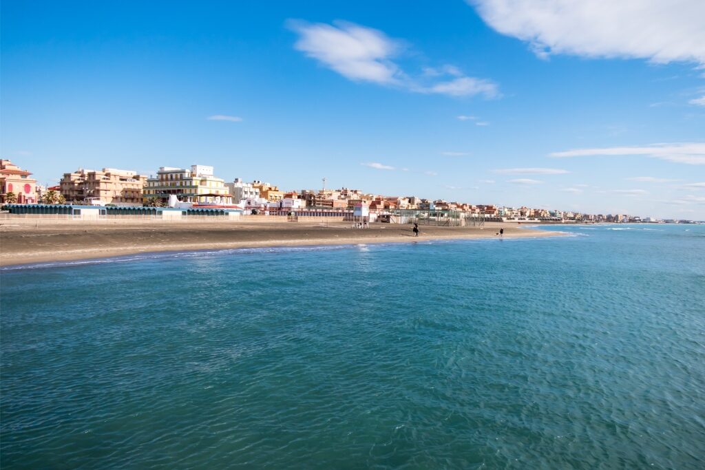 Sunny day at Ostia Beach near Rome, Italy with sandy shore