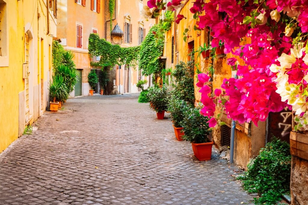 Charming old street in Trastevere, Rome lined with historic buildings