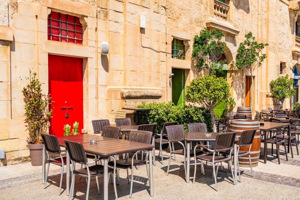 Outdoor seating at a café in Valletta, Malta