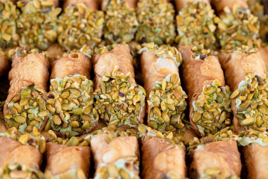 Freshly made kannoli tal-irkotta, a classic Maltese dessert